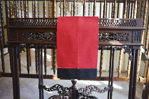 Multicolored Hemstitch Guest Towel. Red & Black colored border